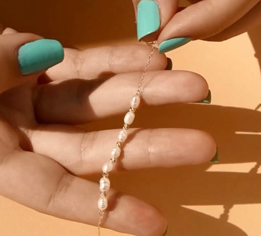 Gourmette perle boules en Or18k