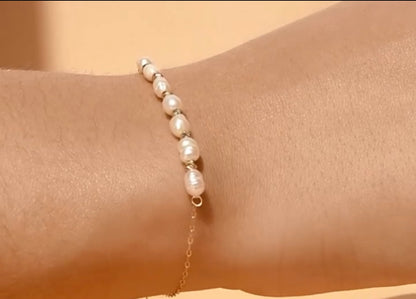 Gourmette perle boules en Or18k