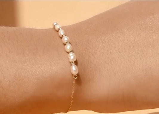 Gourmette perle boules en Or18k